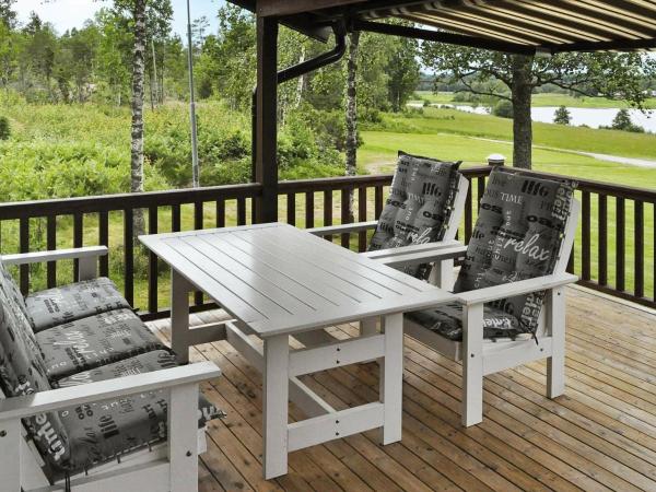 Two-Bedroom Holiday home in Frändefors 1, Prenota Casa vacanze Hotel a Gotaland con parcheggio, Parcheggio